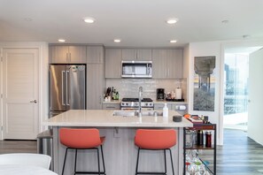 Full Kitchen with Quartz tops and stainless appliances