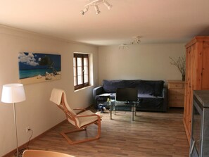 Property, Furniture, Wood, Couch, Shade, Interior Design, Comfort, Flooring, Window, Living Room