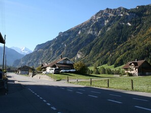 Sky, Mountain, Plant, Property, Ecoregion, Road Surface, Infrastructure, Asphalt, Slope, Natural Landscape