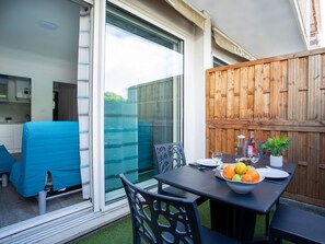 Cloud, Sky, Property, Building, Tree, Wood, Chair, Urban Design, Outdoor Furniture, Table