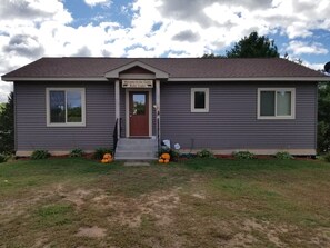 Front of house now has a cement slab in front