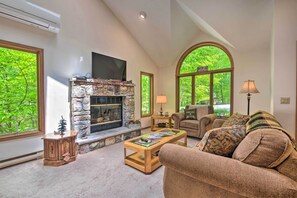 Living Room | 1st Floor | Window A/C Unit | Electric Heating | Smart TV