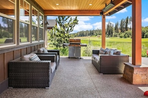 Elk Grove: - Comfortable outdoor living space with overhead heaters and a gas grill.