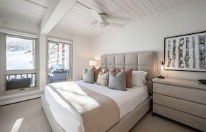Master bedroom with king bed and view of ski hill