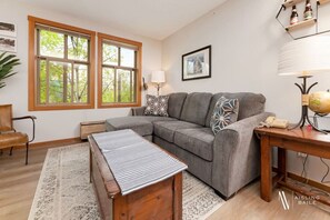Living area with a pull-out sofa sleeper.