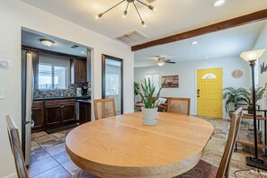 Dining for four with easy access to the kitchen allows you to make memories around the table each time you sit there.