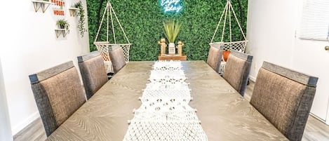 Dine in style and "Enjoy Today" with our custom grass wall (great for pictures!)