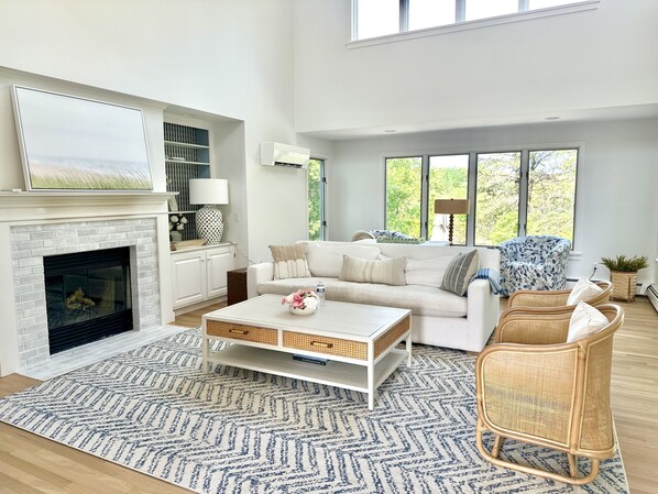 Another view of the bright and airy living room with new furniture. 