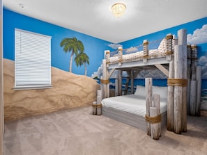 Beach bum themed bedroom with Twin over Queen bunk beds