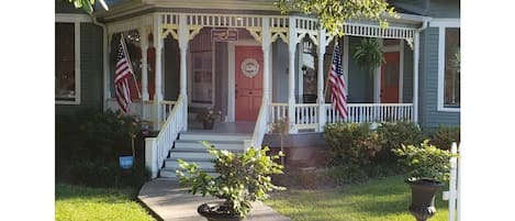 Two sided front porch... rockers and cafe table with chairs