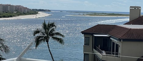 The view from family room/master bed balcony of Marco River and Gulf of Mexico. 