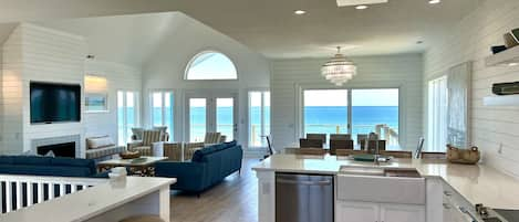 The spacious, airy great room opens to a large ocean front deck