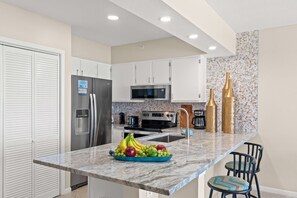 Kitchen - Additional seating at the kitchen island.