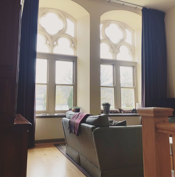 Main Living Space with Large Windows Overlooking Loch Ness