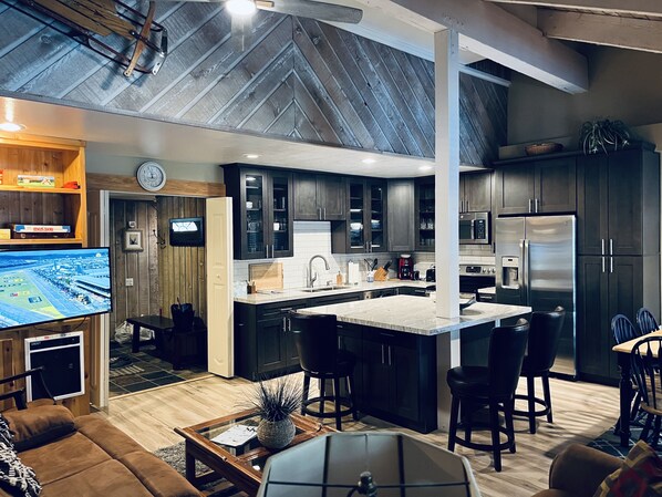 Kitchen and Great Room with elevated ceiling.