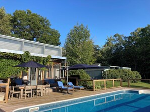 Plenty of seating and shade around the pool.