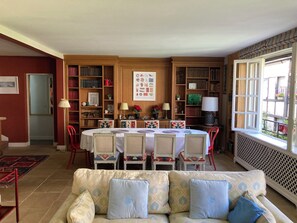 Dining area and in top left corner: stairs leading to kids' floor