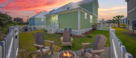 Fully Fenced Backyard with Fire Pit, Weber Gas Grill and Plenty of Seating