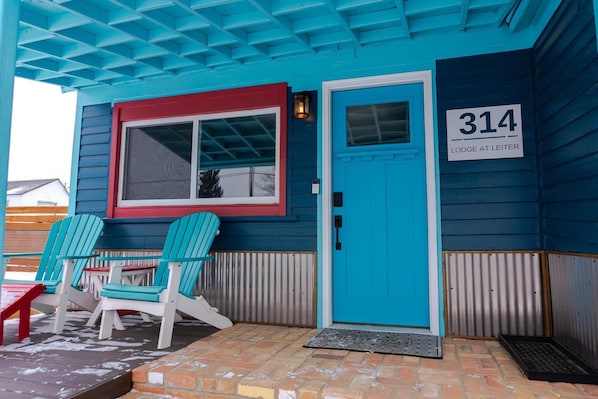 Welcome to Leadville!  We painted the Lodge "Deep Breath Blue".  Seemed appropriate for an elevation of 10,100 feet!  Westward facing, the front porch is the perfect spot for a drink at sunset!