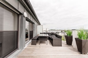 Rooftop retreat with a view—perfect for morning coffee or sunset toasts.