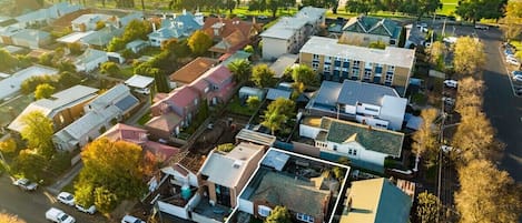 Aerial view looking out toward bay. House is highlighted