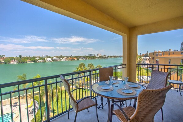 Private Balcony with Waterfront Views of the Bay and Outdoor Dining