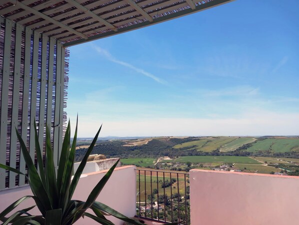 Step straight out onto your private terrace to enjoy 180º cliff edge views!