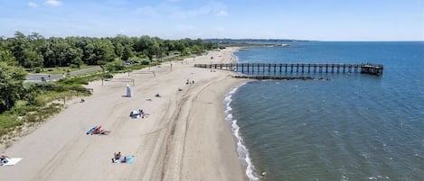 Aerial view of Walnut Beach on the Long Island Sound with pier. 