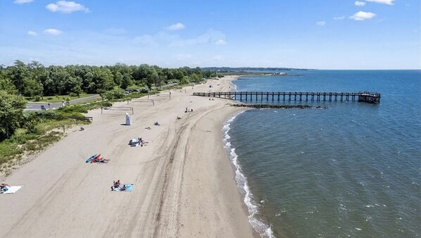 Aerial view of Walnut Beach on the Long Island Sound with pier. 