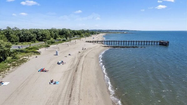 Aerial view of Walnut Beach on the Long Island Sound with pier. 