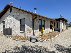 The decorative stone exterior is not only pretty to look at, it also provides a nice layer of insulation between you and the Texas weather!