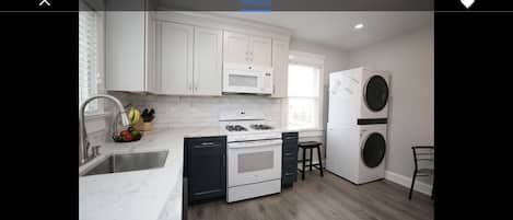 New kitchen with all the amenities you need for a perfect stay. 