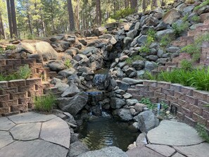 Beautiful Waterfall fountain with small pond.