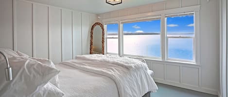 Enjoy the view of the Saratoga Passage right from bed.
