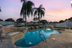 Private, relaxing pool and spa with massaging jets, waterfall, lights and cave! 