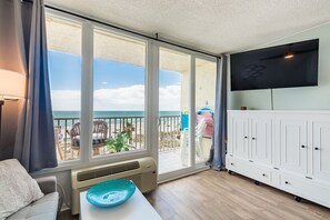 Murphy bed in the white cabinet for extra sleeping space. 