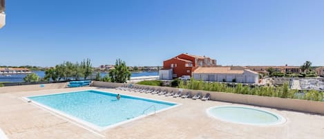 Sky, Building, Water, Plant, Azure, Swimming Pool, House, Tree, Shade, Leisure