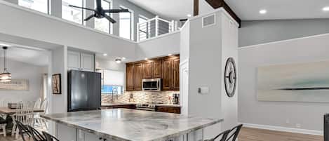 Large kitchen island for cooking, dining, and enjoying company