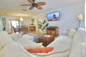 Relax together on the cozy large sectional and stream all your favorites on the Smart TV.