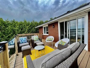 Upstair patio with sofa and chairs