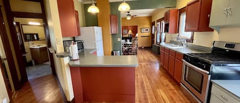 View of kitchen from the entryway. 