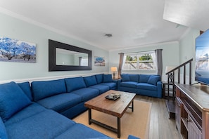 Large living room area. Big 70" television.