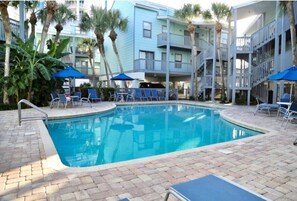 Tropical Pool in the middle of the condos. Large Deck with lounger chairs. 