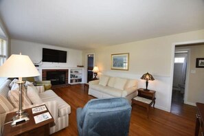 Relax and unwind in our living room complete with a 54" Wi-Fi enabled Smart TV 