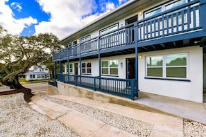 Beach: Upstairs Apartment. Entrance is located furthest away from street.