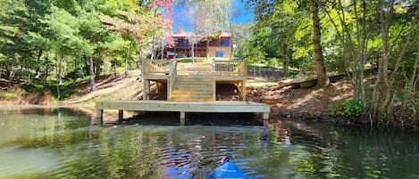 Rear view of dock, property & cabin from the lake (spring/summer)