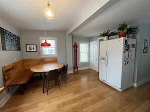 Enjoy your meals in this custom dining nook crafted by woodworker friends