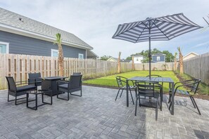 Enjoy gathering around the gas fire pit with lounge seating for four - bring your smores :)