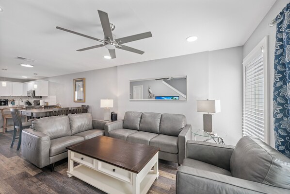 Stylish decor and accent pieces in the cozy living space with access to the private balcony