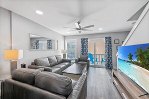 Enjoy the light, bright and airy feel as you relax in the living area.